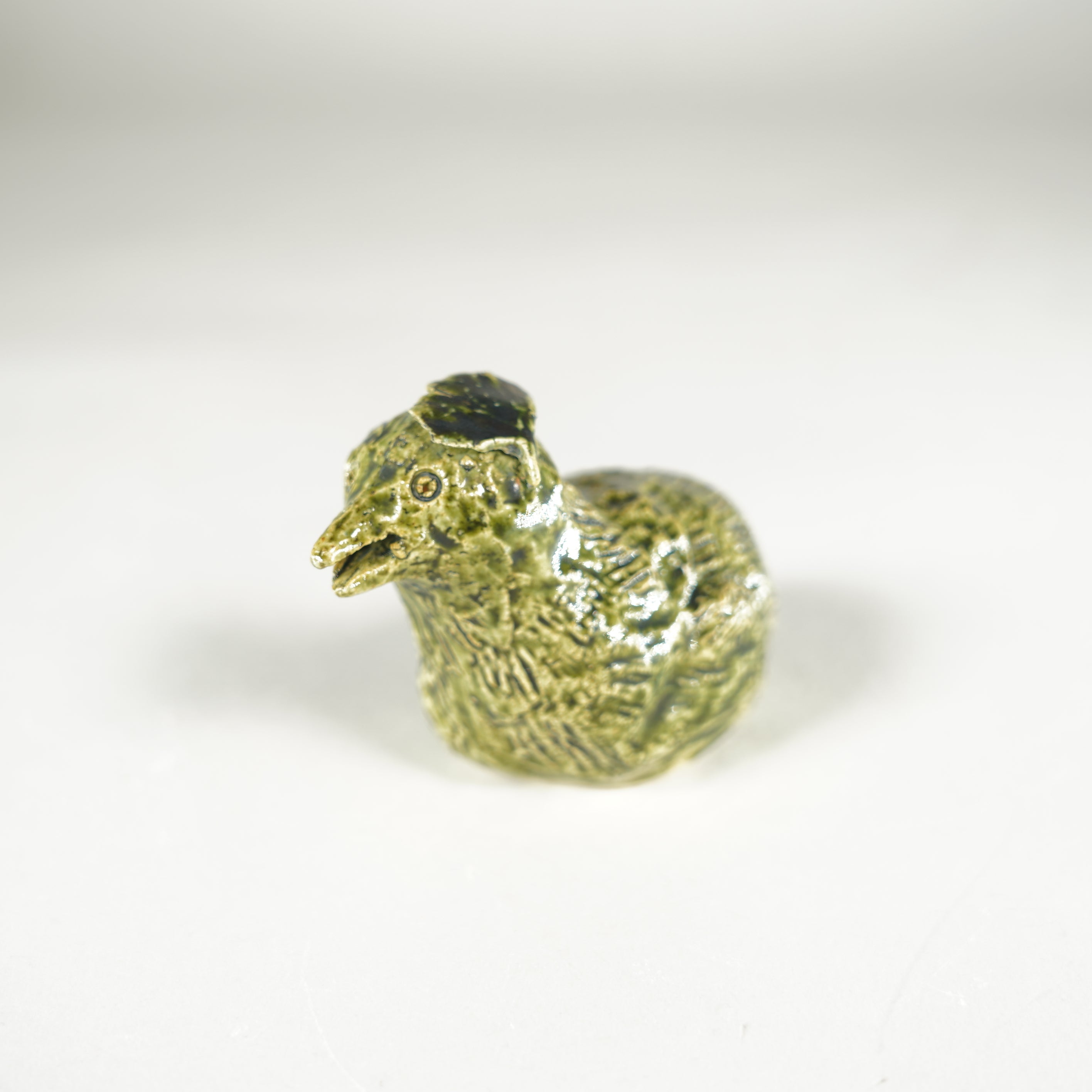 Figurina / verde della quaglia in ceramica