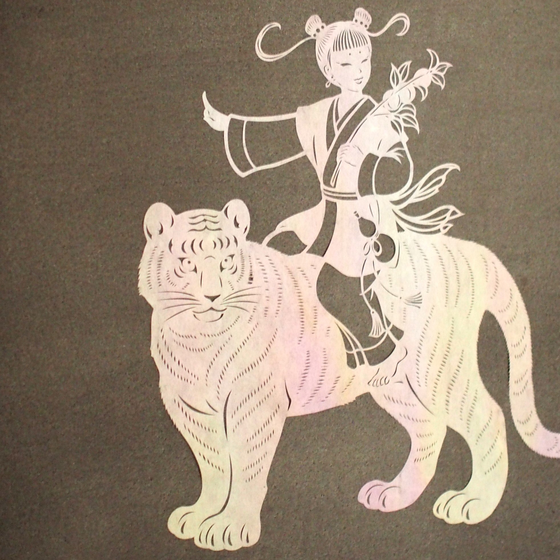 Kunstspeicherkunst / ein Kind, das mit einem Tiger fährt