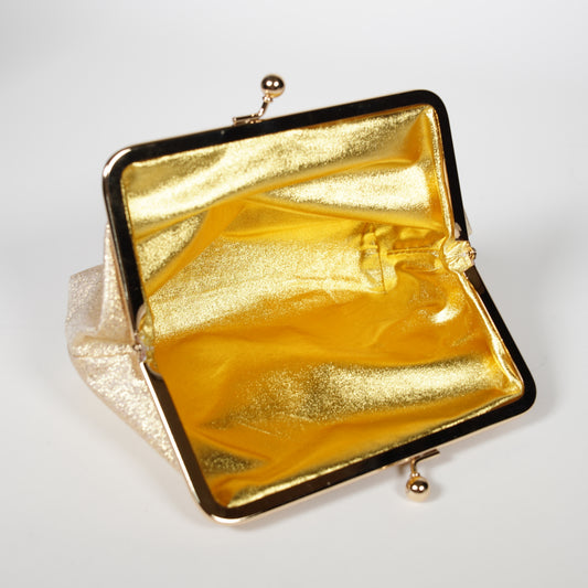 Filo / borsa d'oro con una chiusura