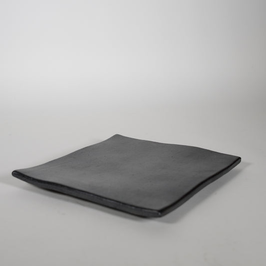 Quadratische schwarze Platte