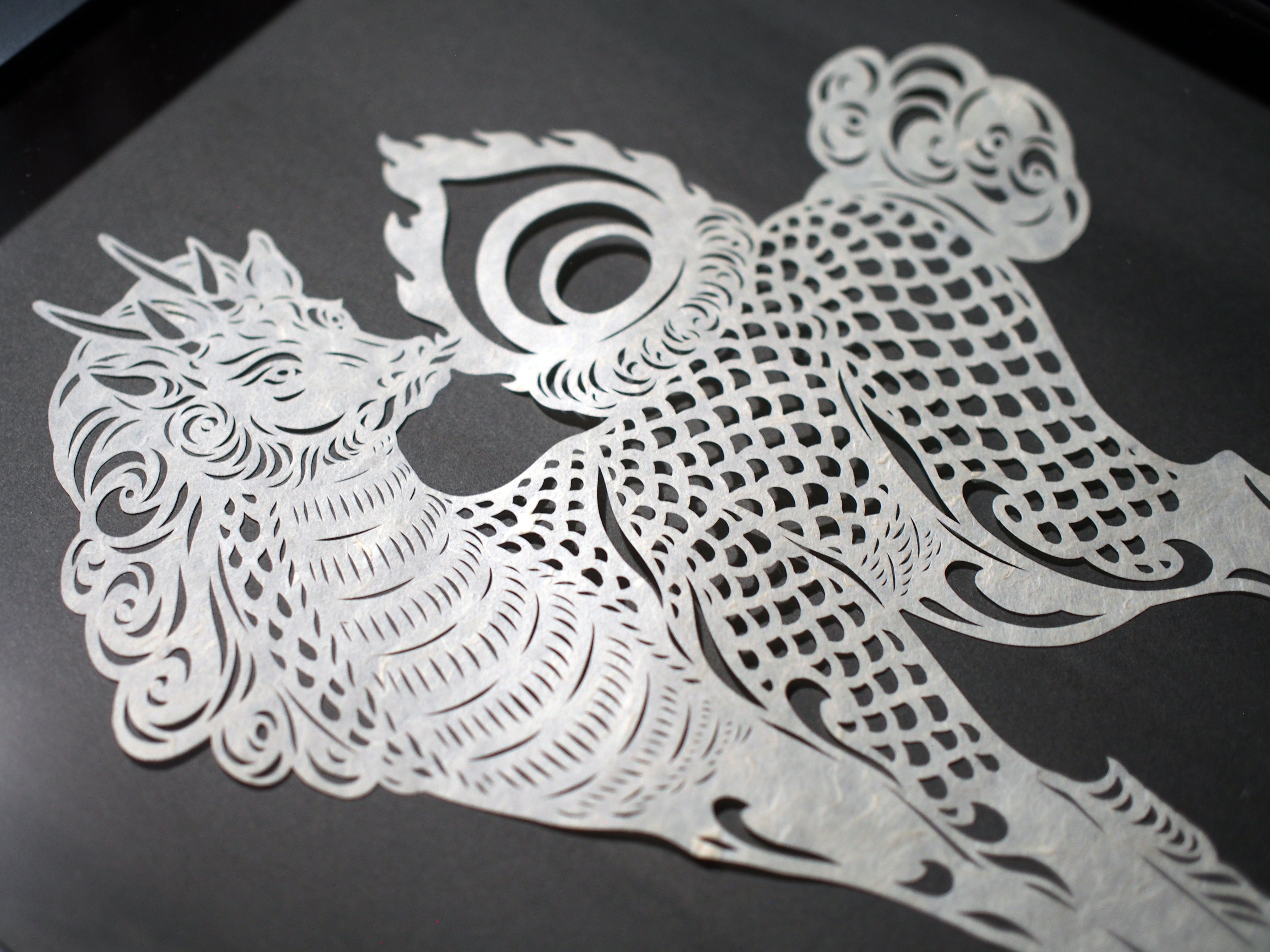 Art de coupe en papier / Qilin