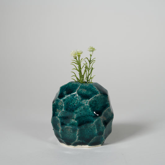 Mini jarrón para una flor verde
